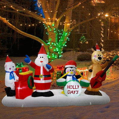 2 two factory Inflatables Santa and snowman playing cornhole